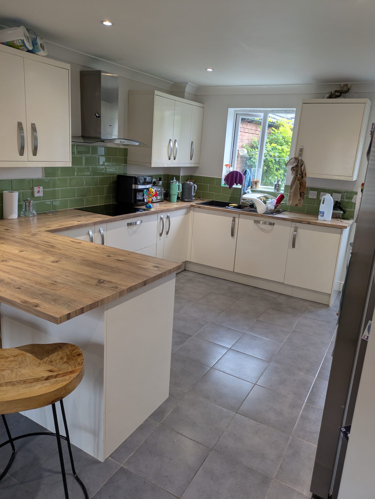 Can You Spray Laminate and Foil-Wrapped Kitchen Cabinets? Adhesion Primers Explained